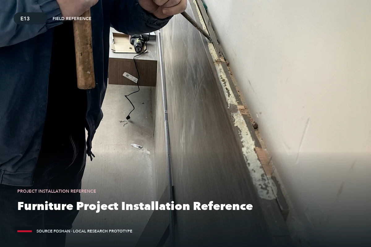 Illustrative research reference showing fitted furniture components being checked during on-site work.