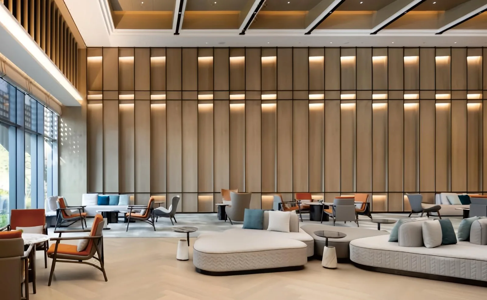 Hotel lobby lounge with modular seating and tall timber screens