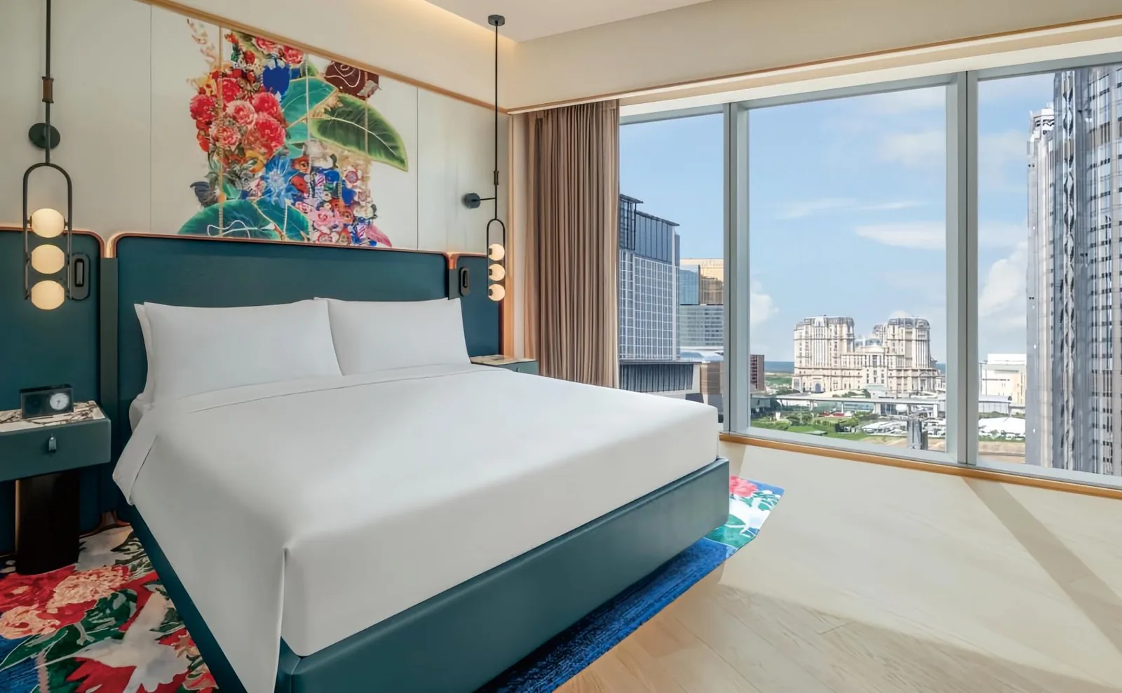 Luxury hotel suite with lounge seating and city view