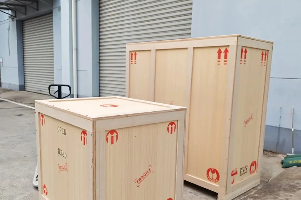 Finished timber crates staged at the warehouse door ready for the container