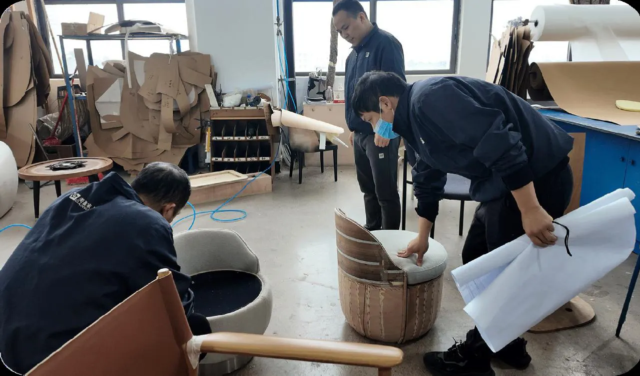 Sample development: a chair frame checked against the drawing