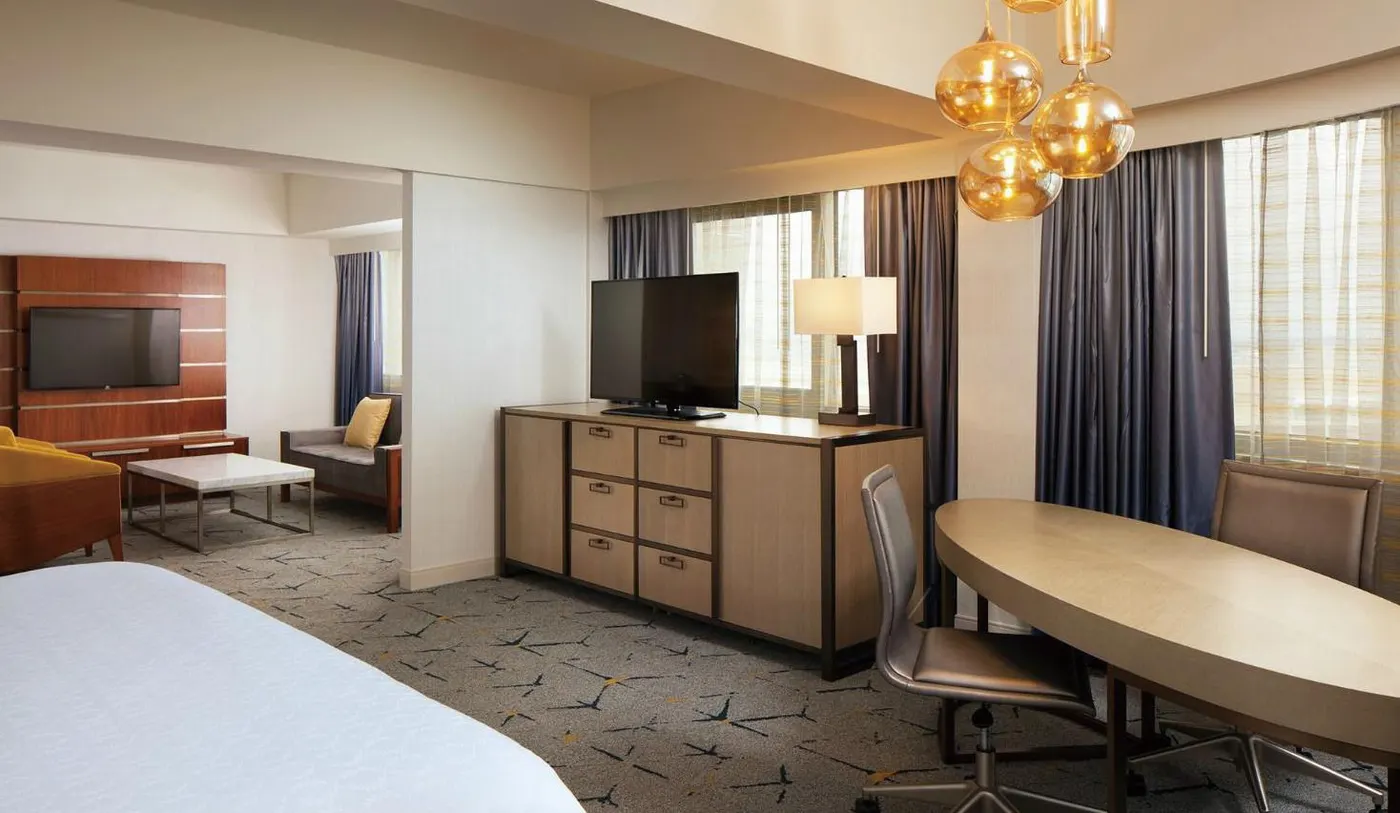 Hotel guestroom casegoods: dresser, desk and meeting table