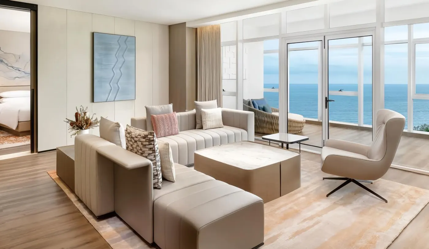 Resort suite living room with sofa and coffee tables