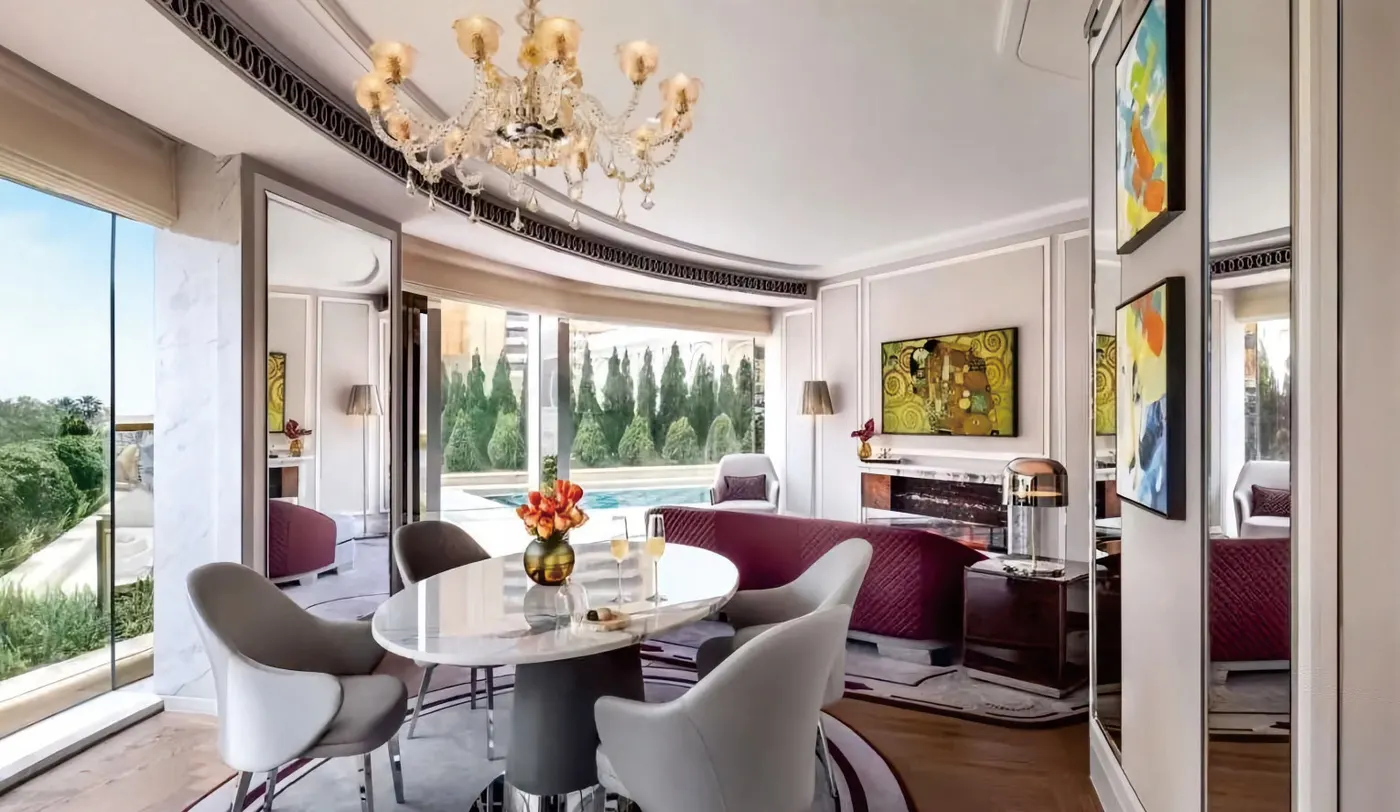 Luxury suite living and dining room with round table