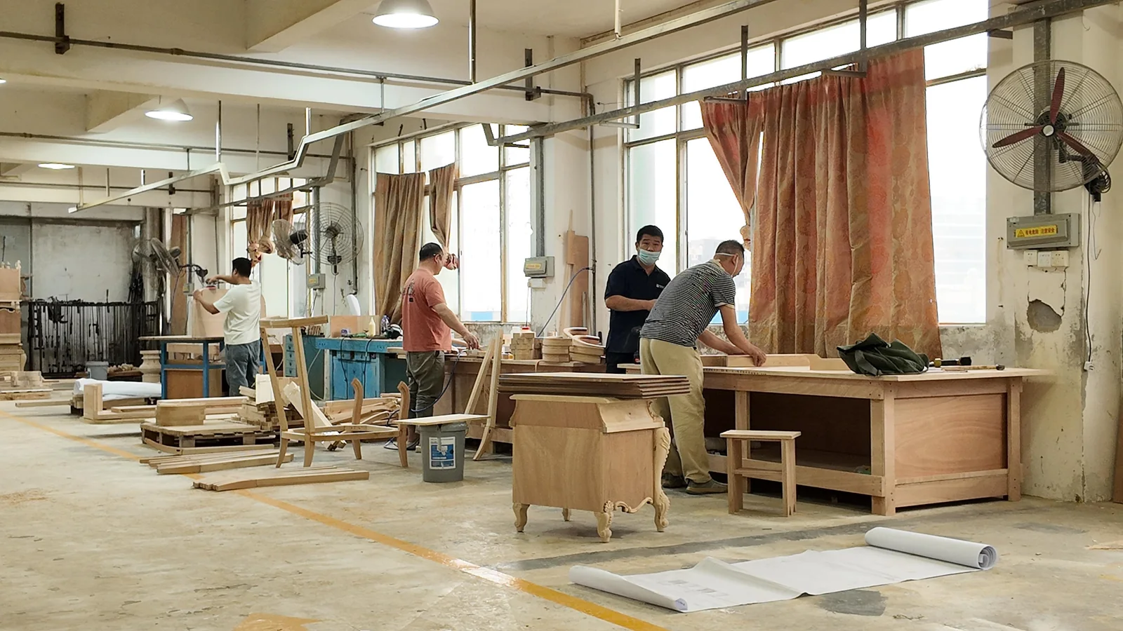 Joinery floor of a hospitality furniture factory with casegood frames being assembled