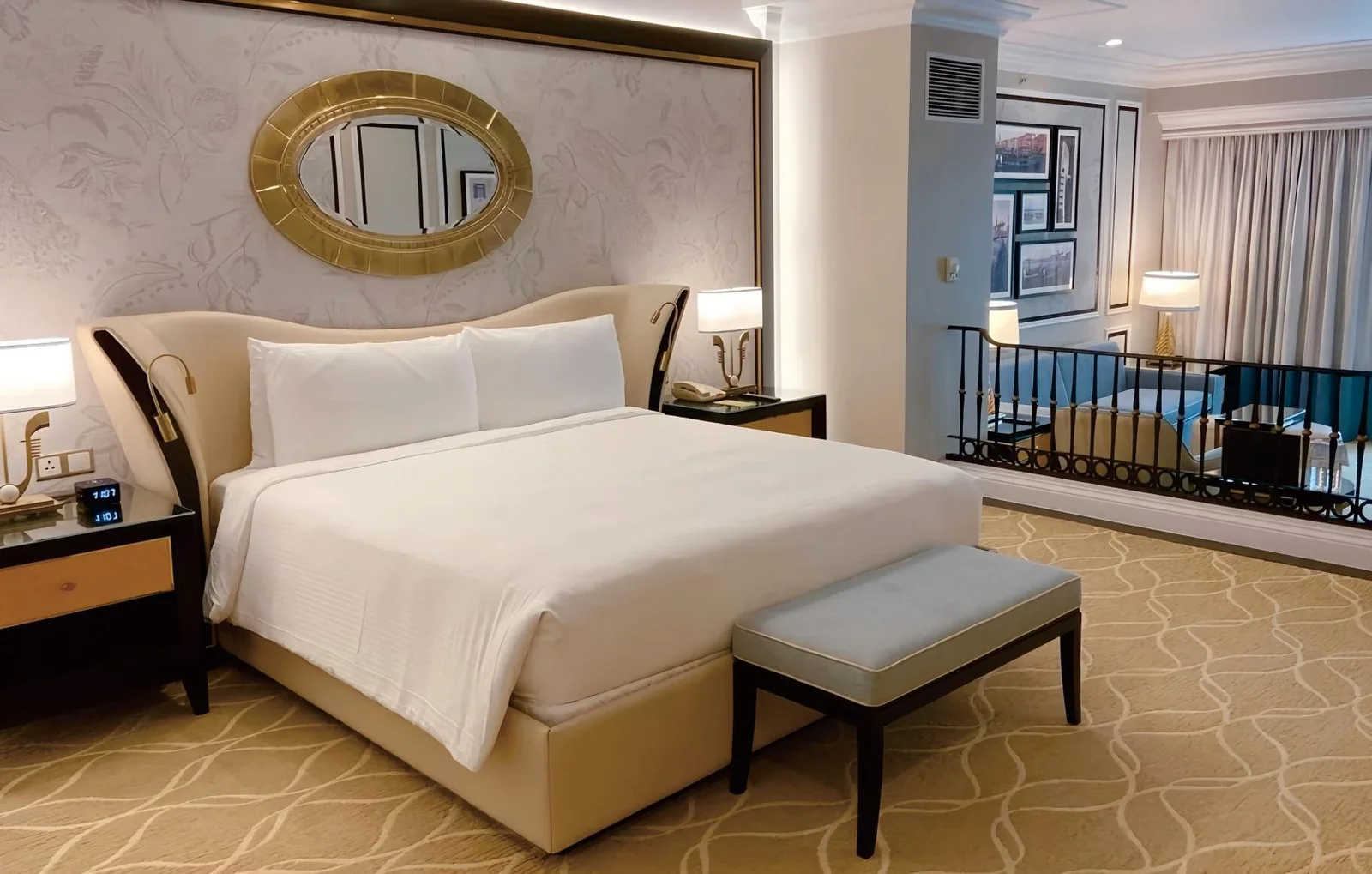 Classic hotel guestroom with upholstered headboard, bench and nightstands produced by a Foshan hospitality factory