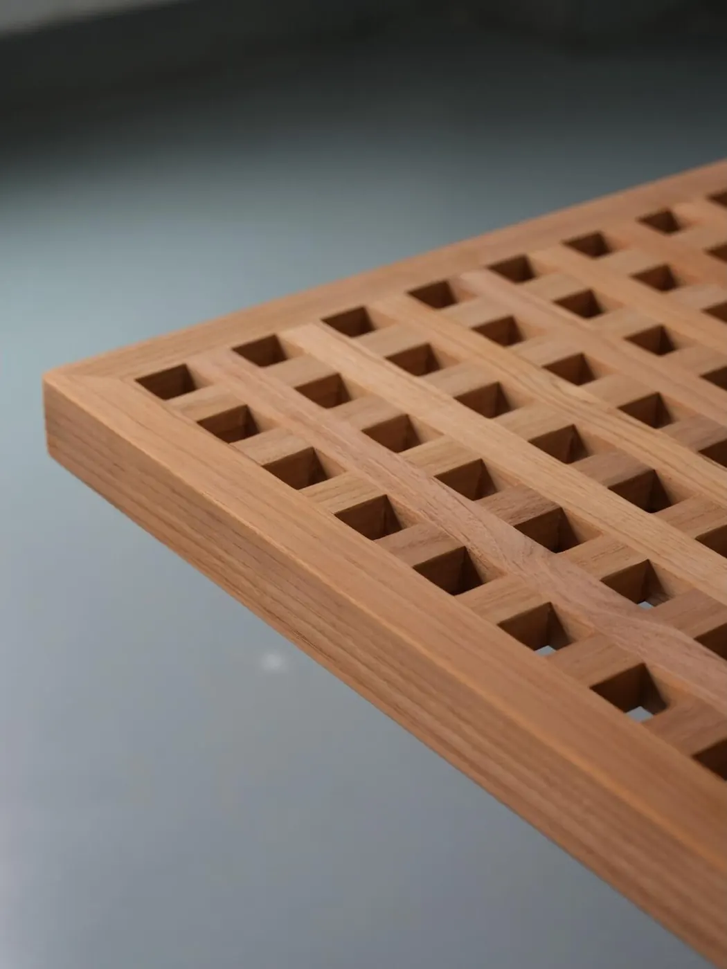 Close-up of a teak lattice table top