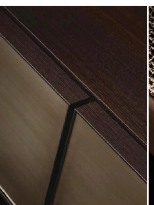 Drawer runner and hinge hardware inspected on a cabinet