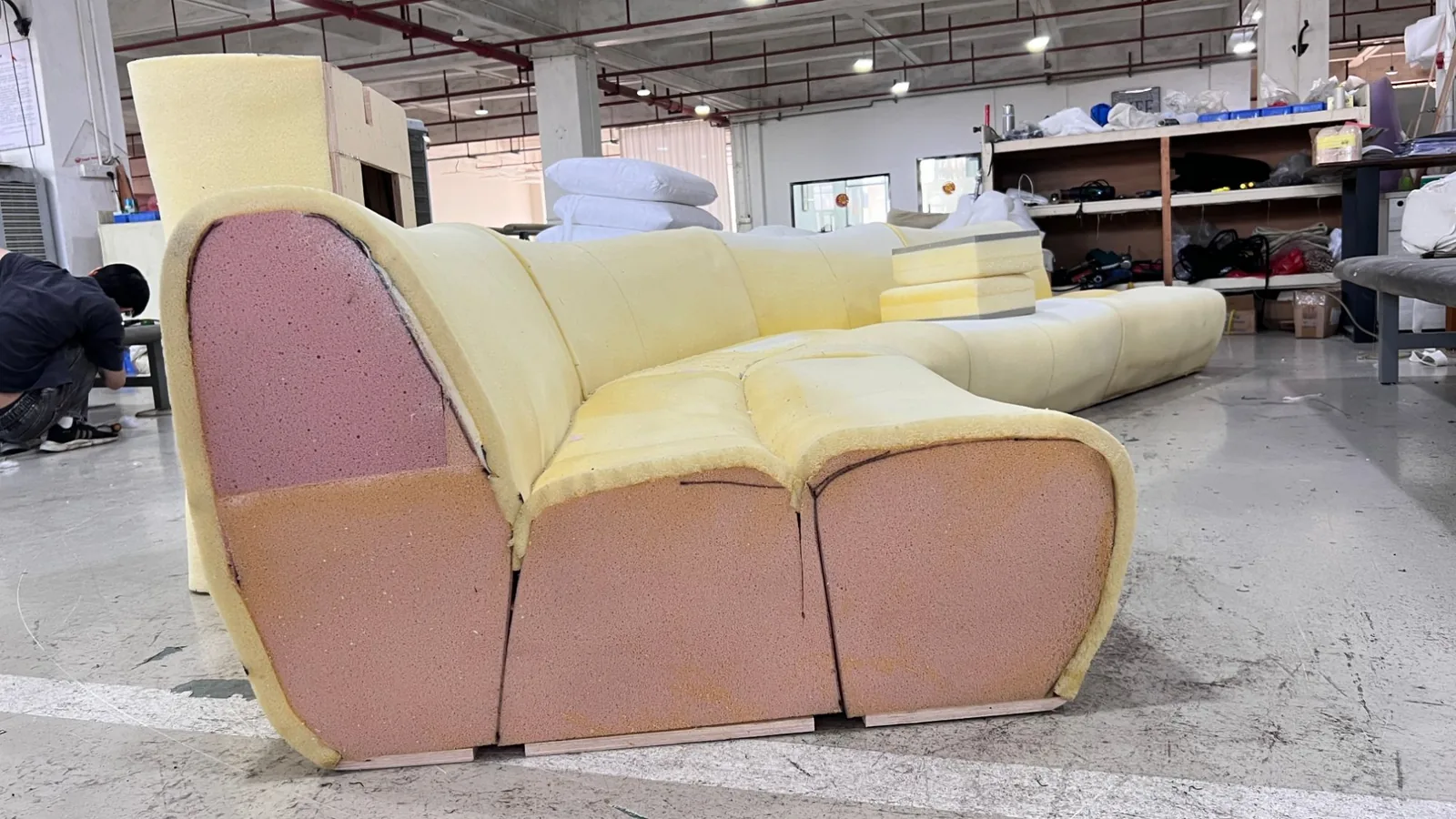 Bare seat showing foam layers before upholstery