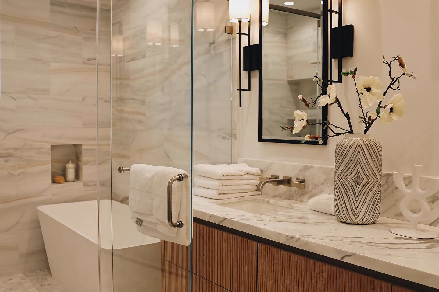 Installed custom bathroom vanity coordinated to wall and plumbing