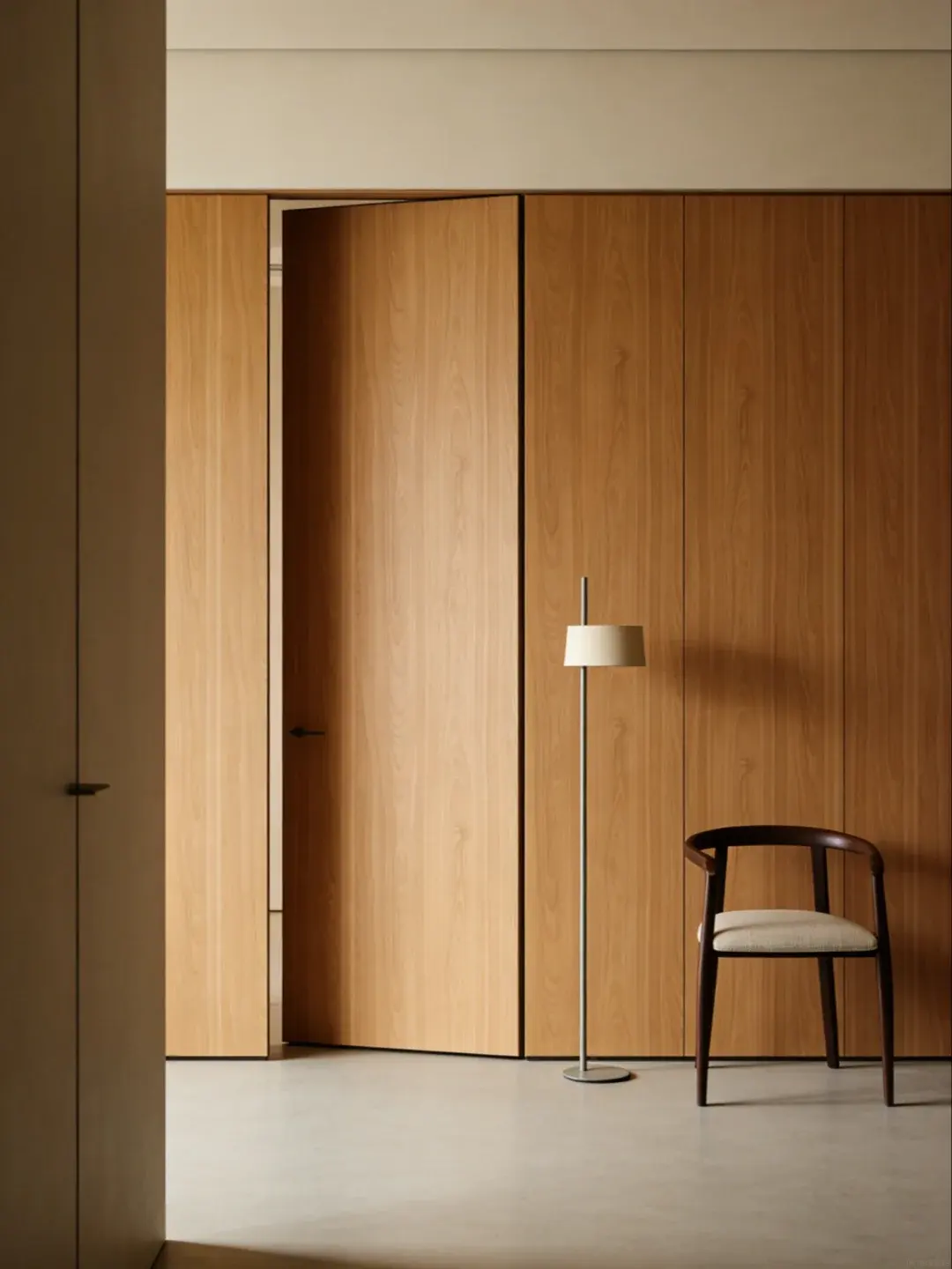 Hidden pivot door integrated into an architectural wall