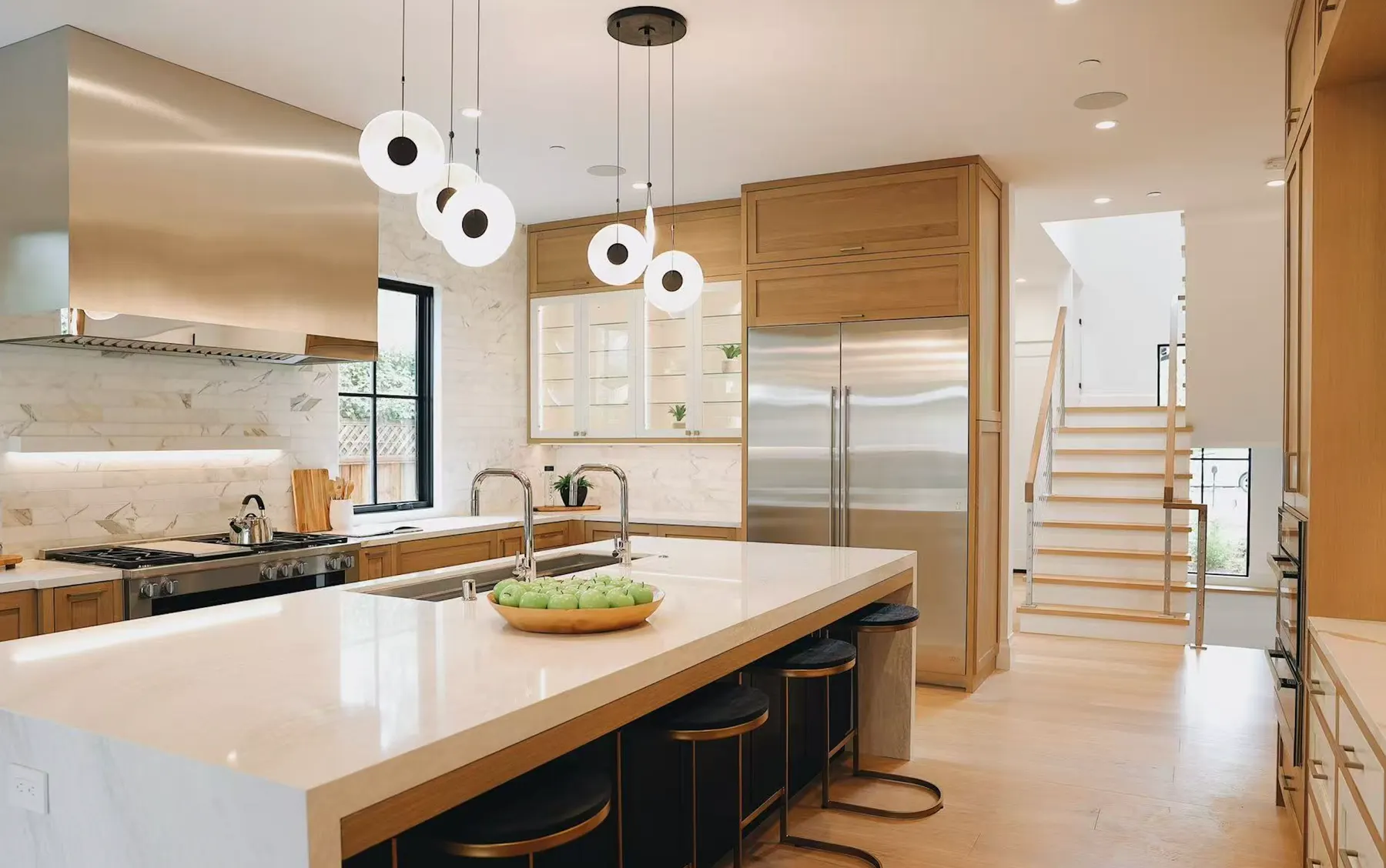 Integrated kitchen, wall panels and fitted cabinetry coordinated by Source Foshan