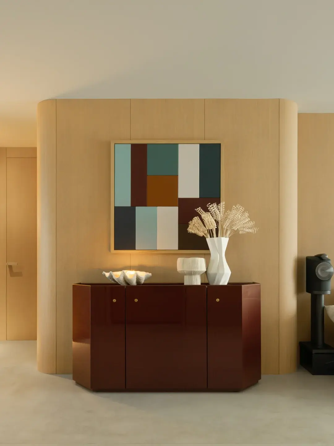 Custom living-room credenza and integrated wall treatment