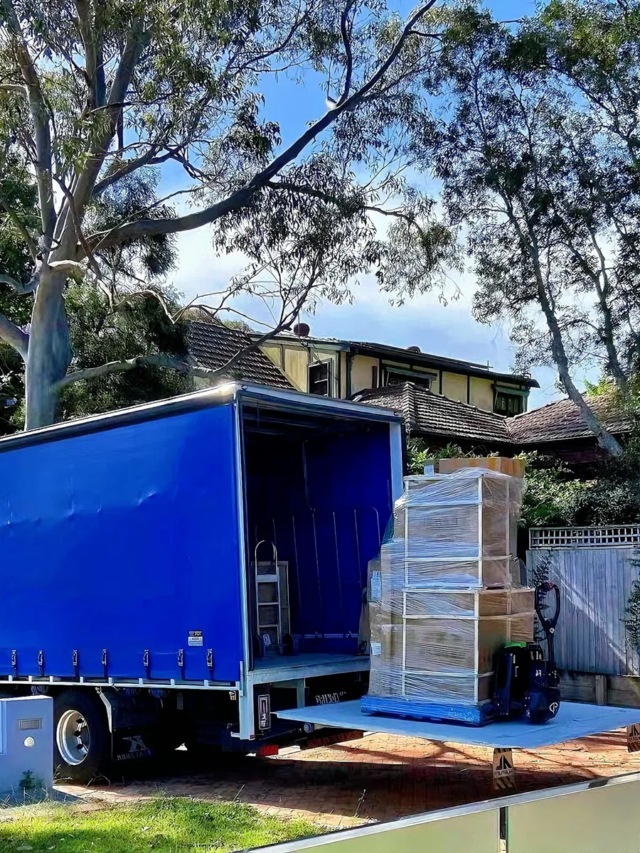 Australia: the delivery truck at the house, about 30 days after sailing.