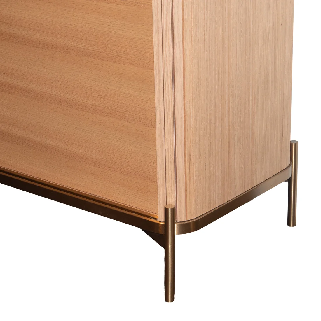 Close view of a curved wood veneer bar cabinet corner with brushed metal base and legs