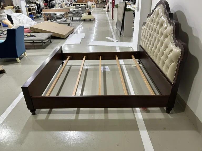 Rows of bare timber sofa frames in a Foshan upholstery factory