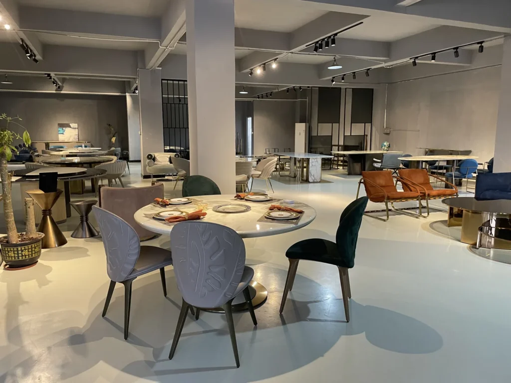 Wide view of a furniture showroom floor in Foshan with lounge settings