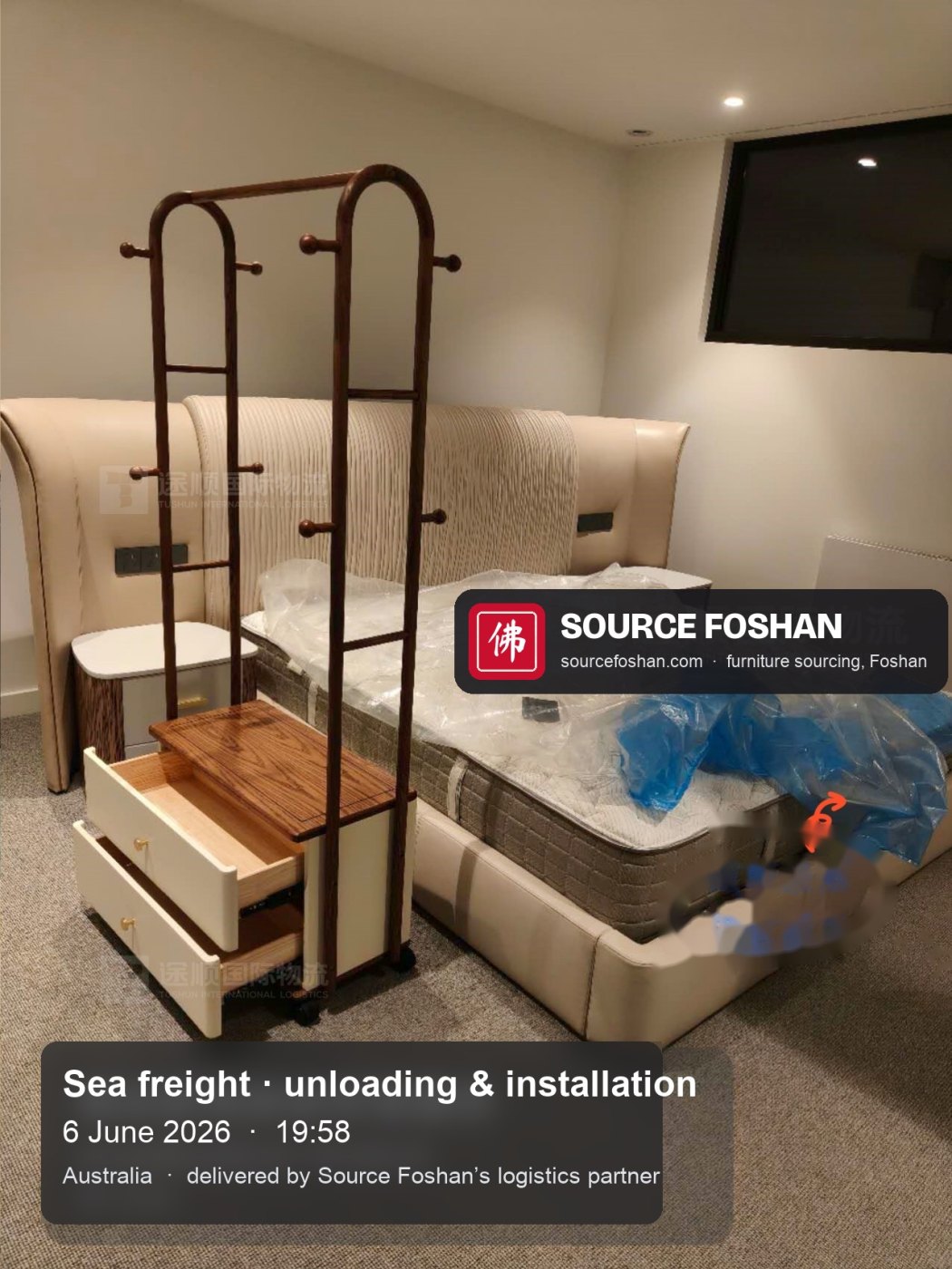 Upholstered bed, mattress and clothes rack in place, 19:58