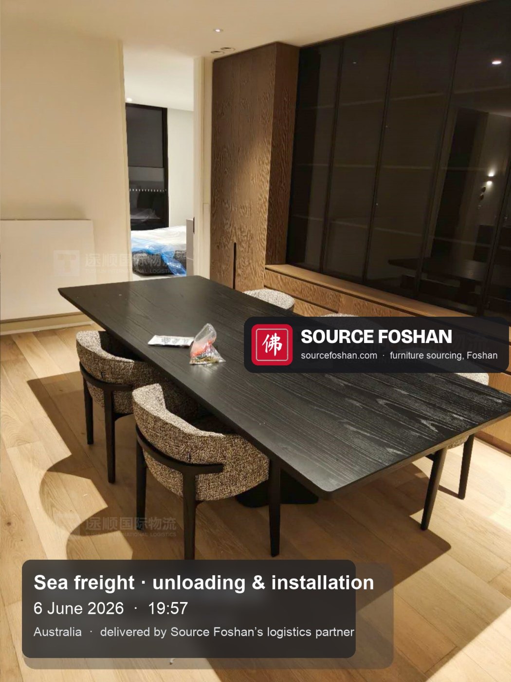 Black dining table with six upholstered chairs installed, 19:57