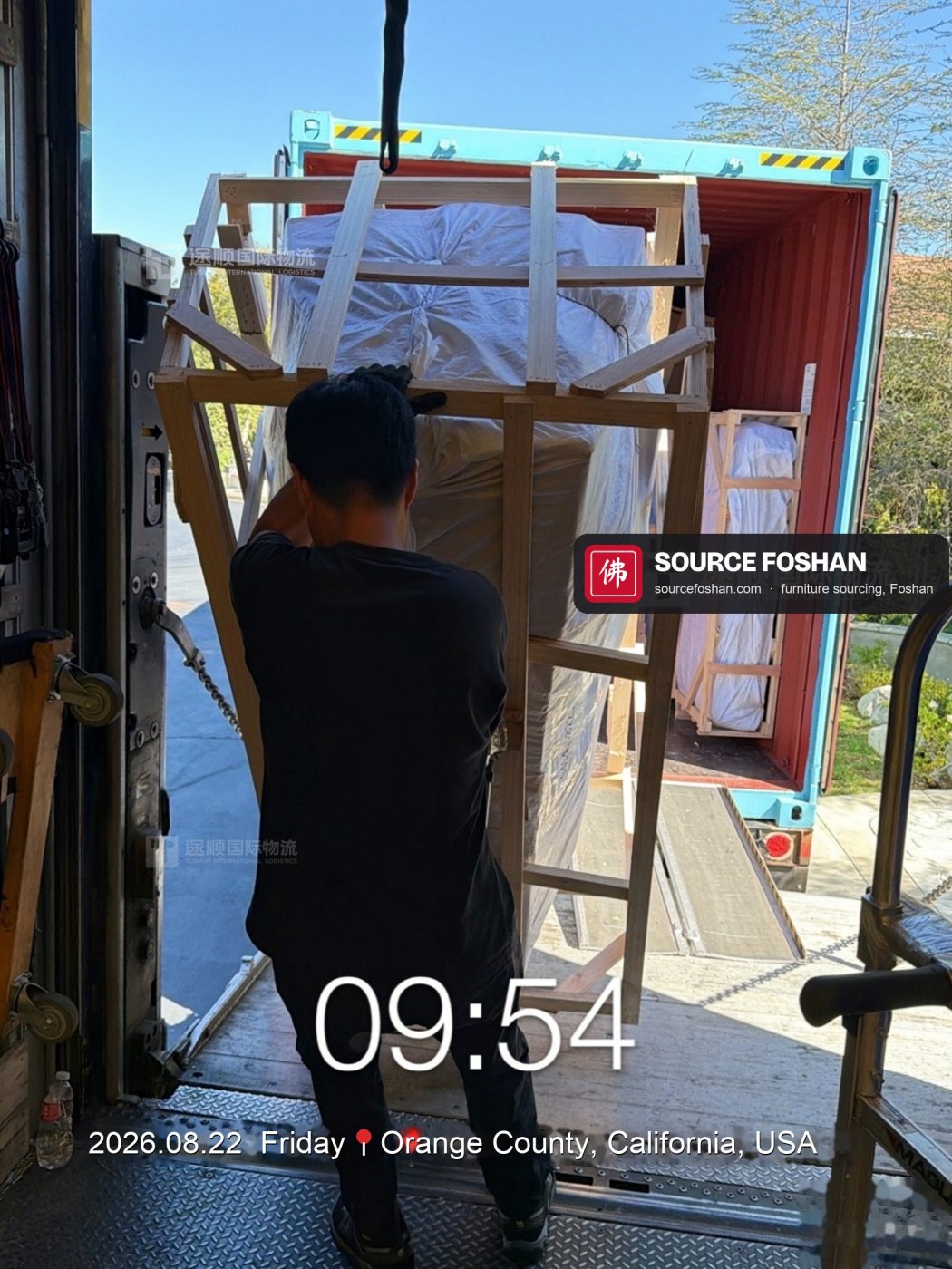 Caged piece carried down the container ramp, 09:54