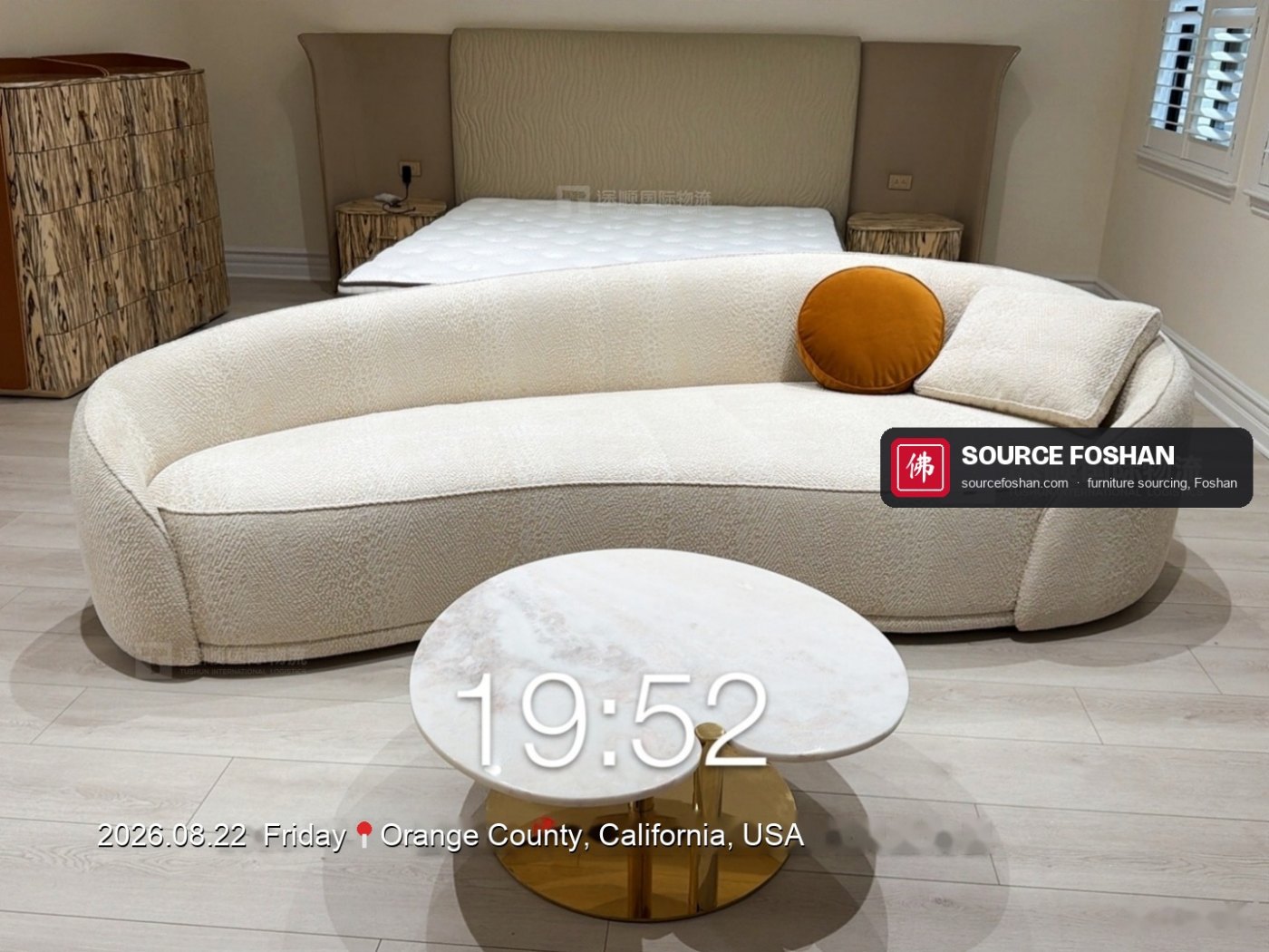 Curved boucle sofa and marble side table, 19:52