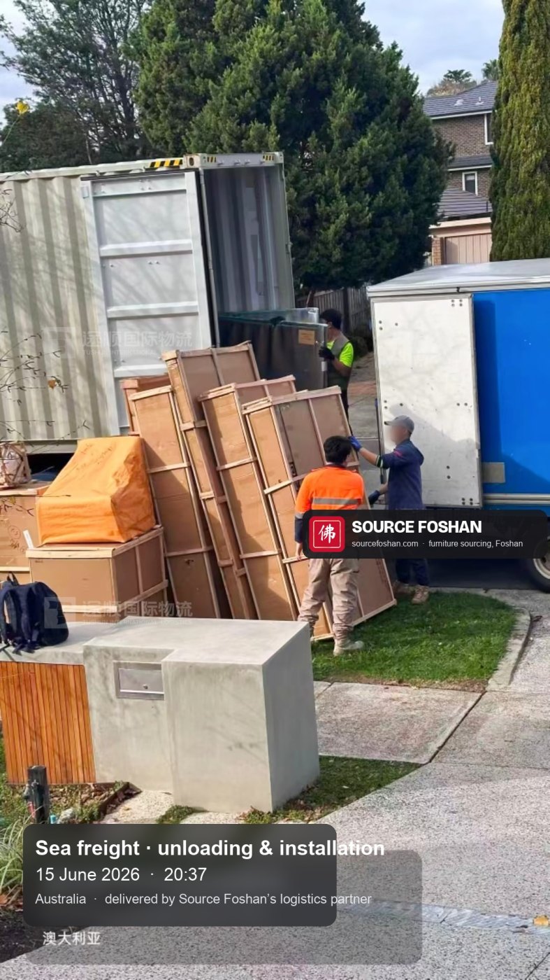 Crates moved from the container to a box truck on a Melbourne street, 20:37