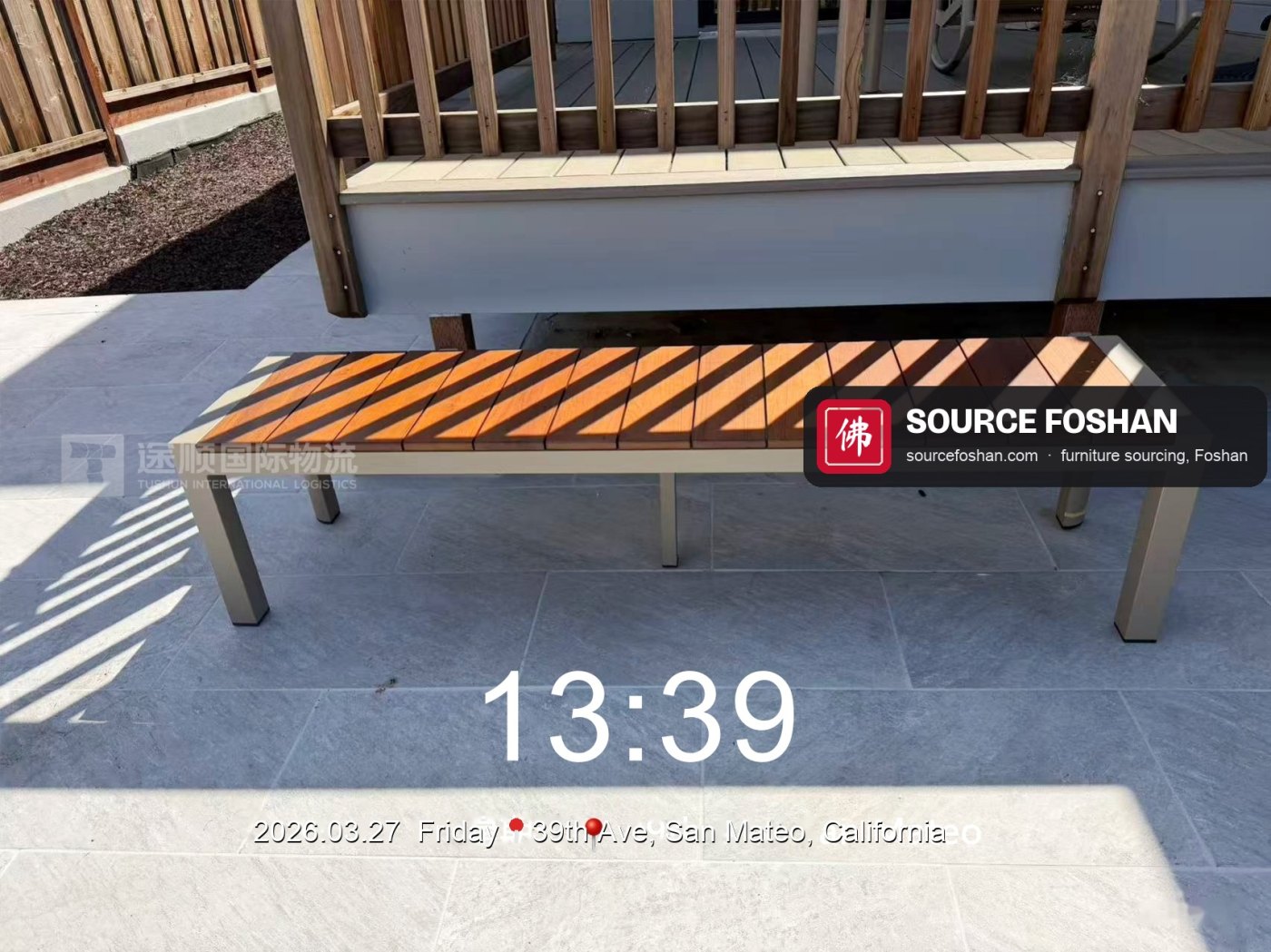 Slatted outdoor bench on the patio, 13:39