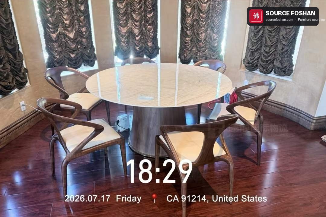 Round dining table and six chairs installed
