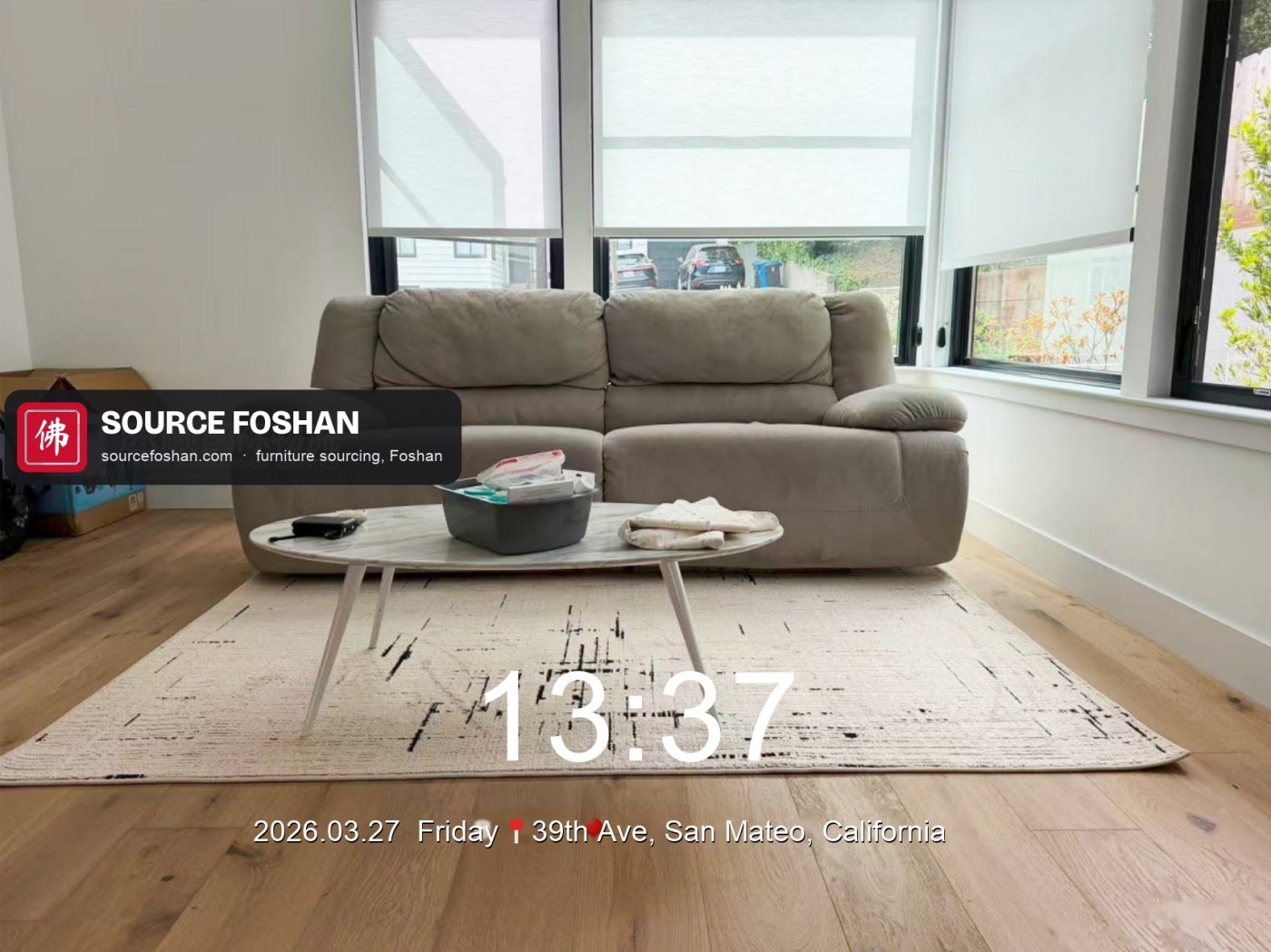 Two-seat sofa and coffee table in the family room, 13:37