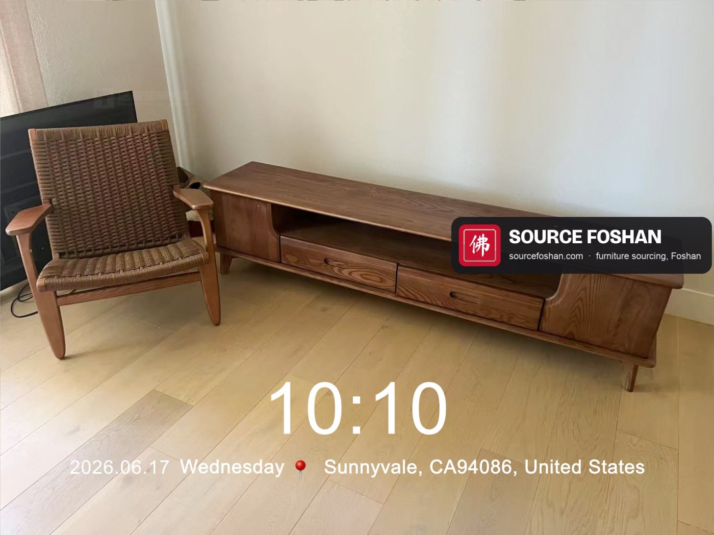 Solid-wood TV unit and armchair installed, 10:10