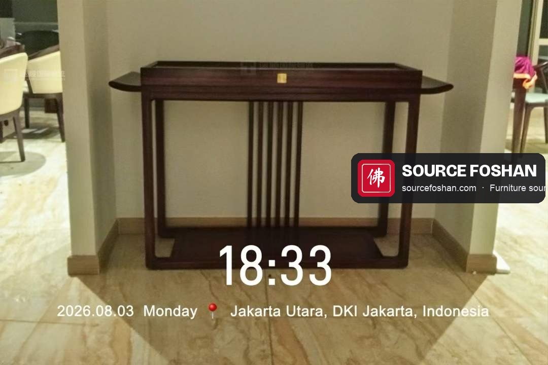 Walnut console table from Foshan set against the wall