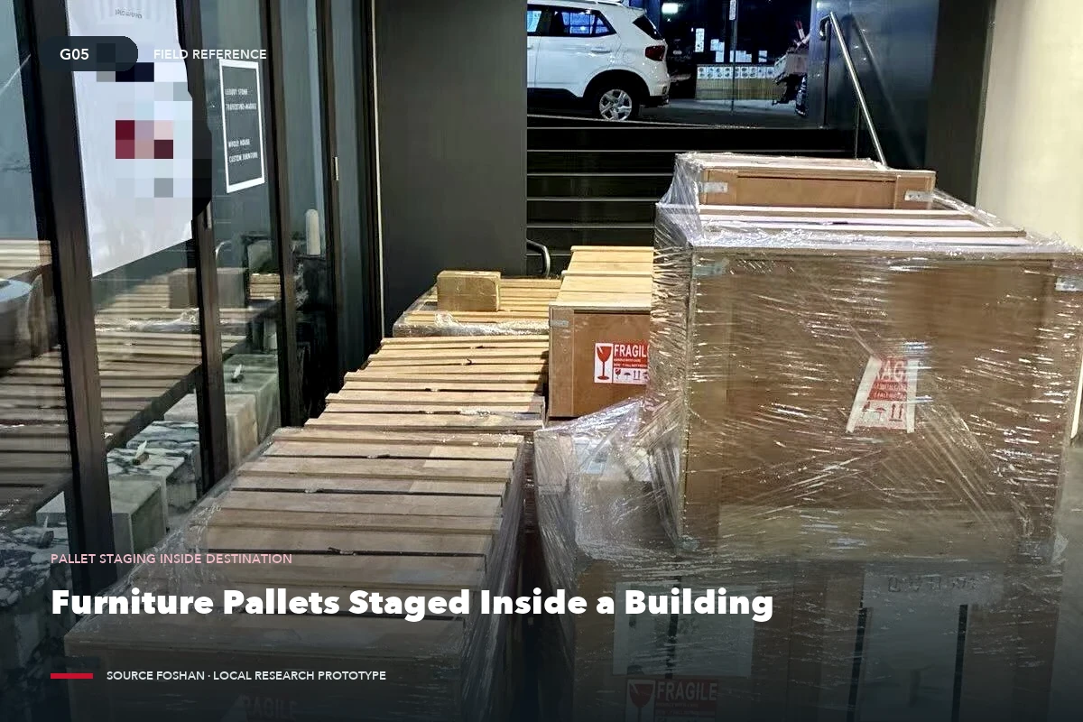 Wrapped furniture pallets staged indoors for count, condition, and route checks.