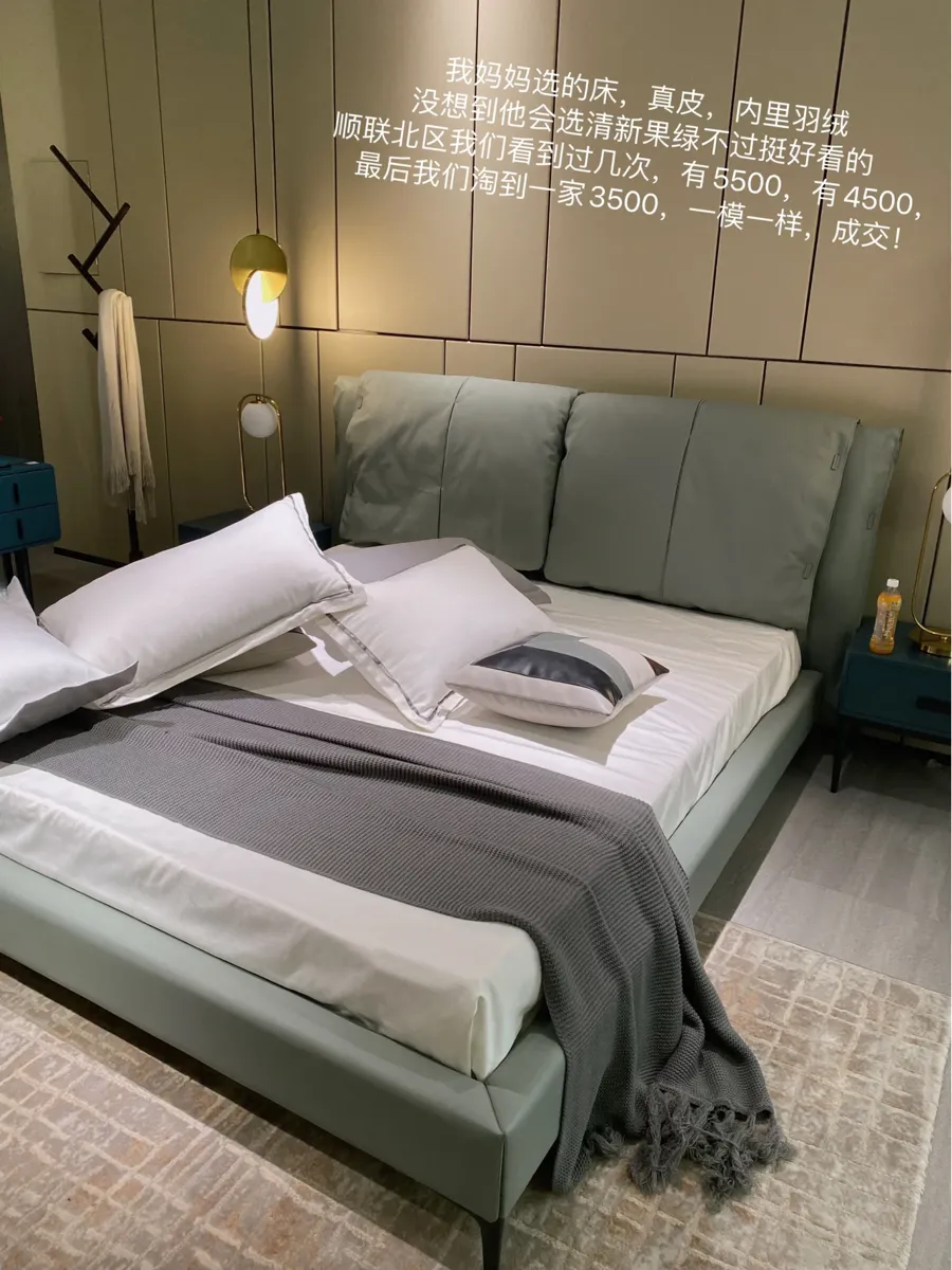 An upholstered bed display. Ask what the slats, frame and headboard filling are made of.