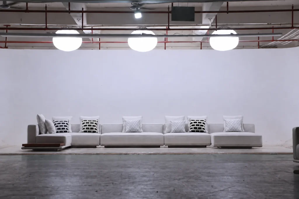 Long sofa display inside a Lecong furniture showroom in Foshan