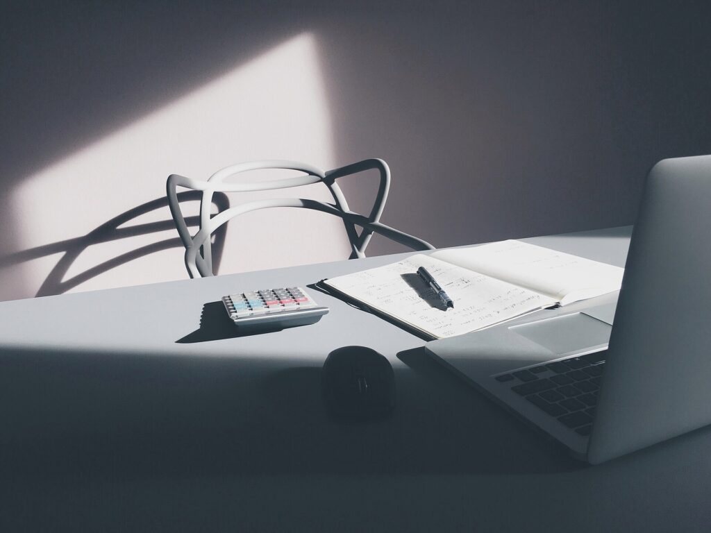 Unrelated calculator desktop illustrating a clearly labelled scope adjustment, not a market price
