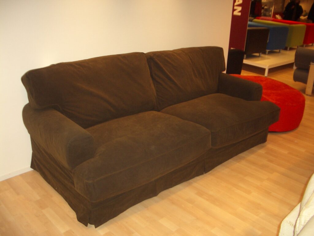 Unrelated brown sofa illustrating that a product photo alone cannot define the quoted construction