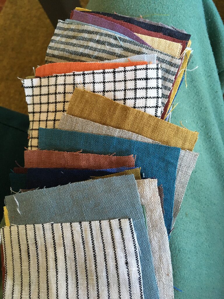 Unrelated fabric swatches illustrating the need to identify the exact finish priced