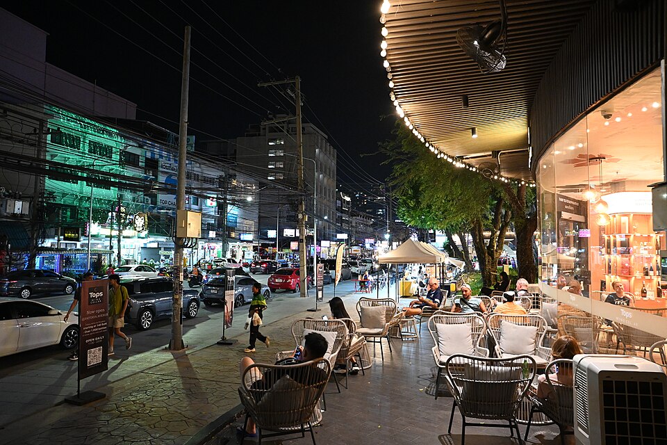 Unrelated evening street scene illustrating a late-day route decision
