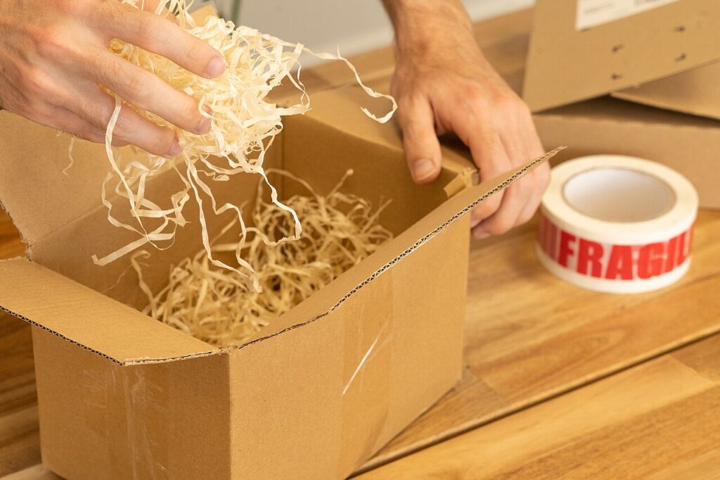 Unrelated box with wood wool illustrating cushioning and void fill
