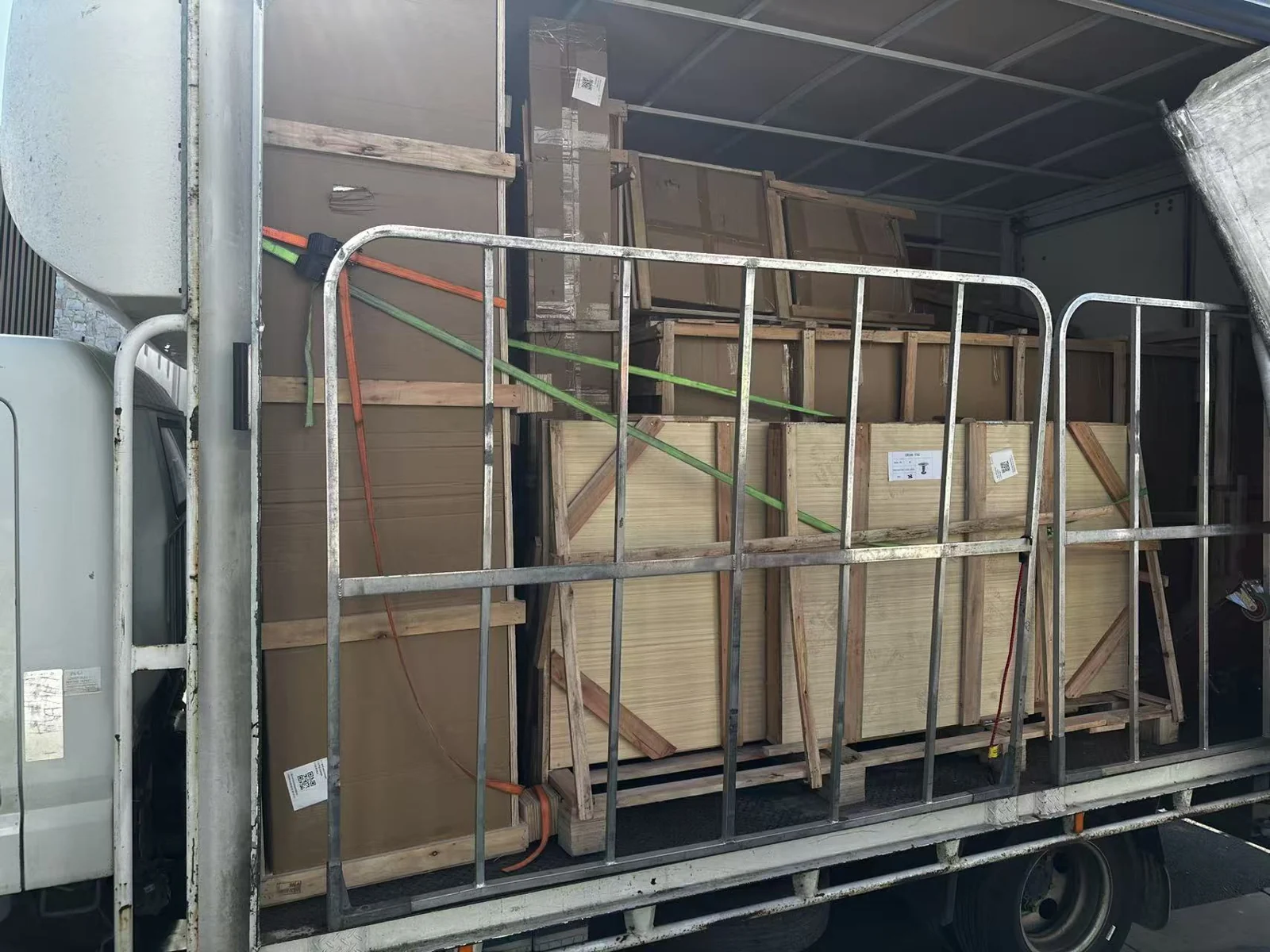 Timber-framed furniture and cartons inside the local delivery truck