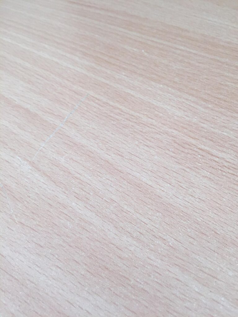 Unrelated scratched surface illustrating a condition exception record