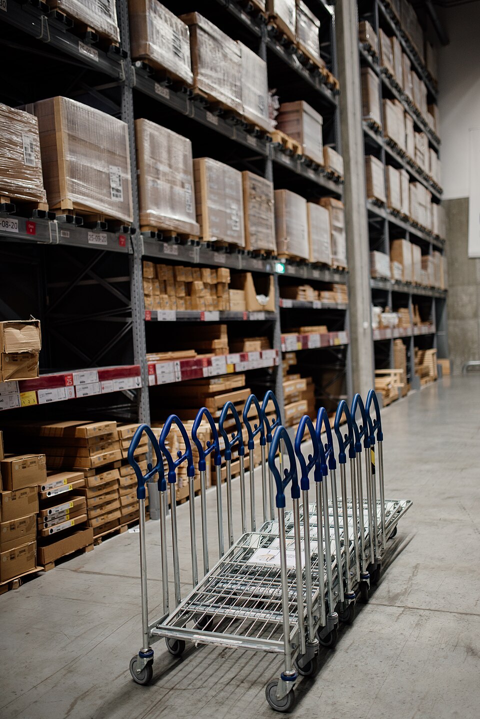 Unrelated warehouse shelves illustrating later receipt comparison against the sample record