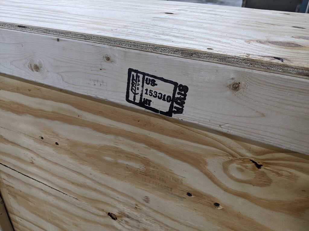 Unrelated marked wood crate illustrating an ISPM 15 material question