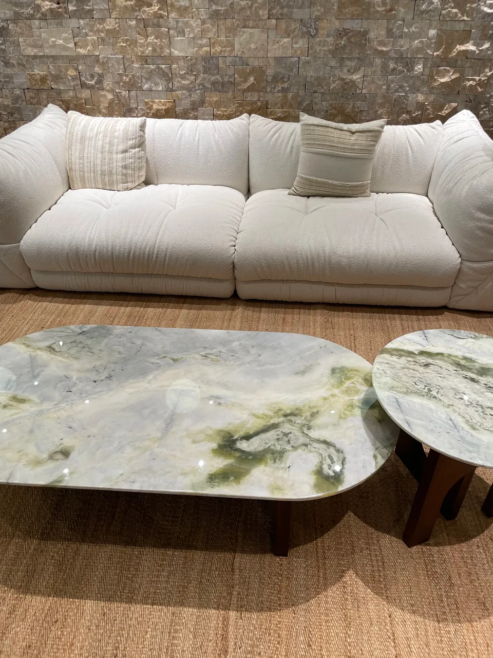 Sydney living room with upholstered seating and a patterned coffee table
