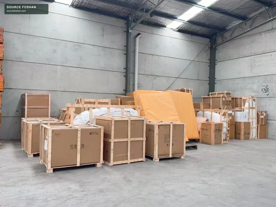 Cartons and timber-framed furniture crates in the Sydney warehouse
