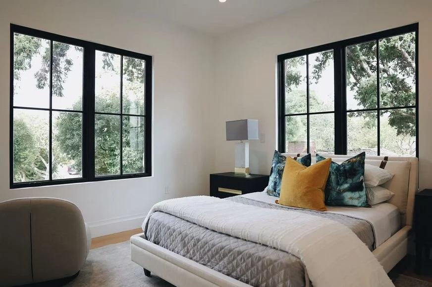Upholstered bed and bedside furniture in the Menlo Park home