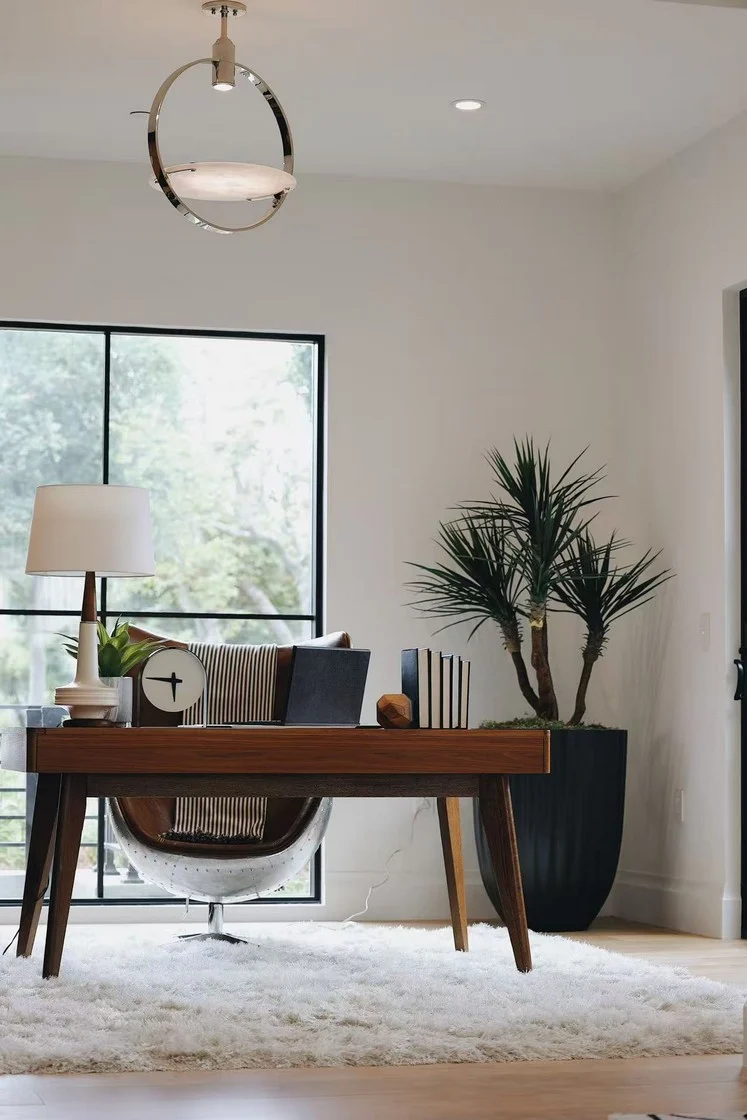 Wood desk and upholstered office chair in the Menlo Park home