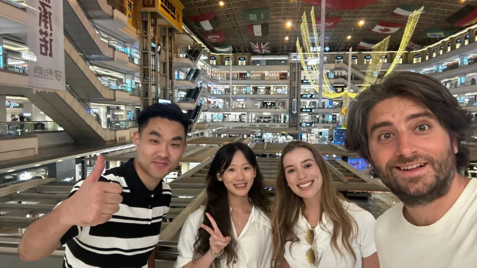 The visiting buyers and sourcing team together inside Louvre furniture mall.